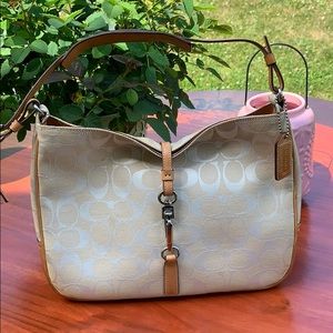 Coach signature handbag.